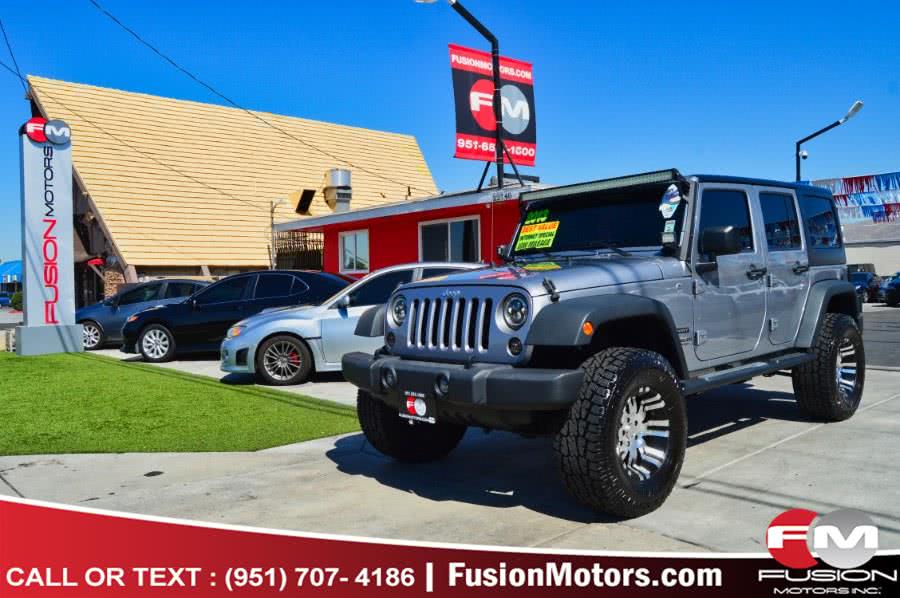 2013 Jeep Wrangler Unlimited 4WD 4dr Sport, available for sale in Moreno Valley, California | Fusion Motors Inc. Moreno Valley, California