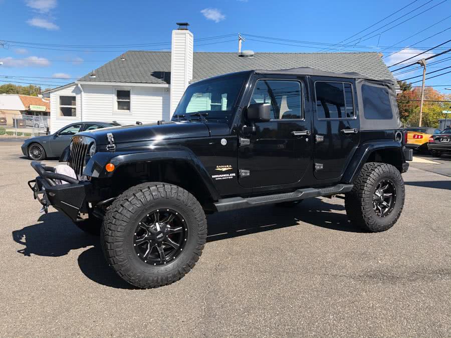 2012 Jeep Wrangler Unlimited 4WD 4dr Sahara, available for sale in Milford, Connecticut | Chip's Auto Sales Inc. Milford, Connecticut