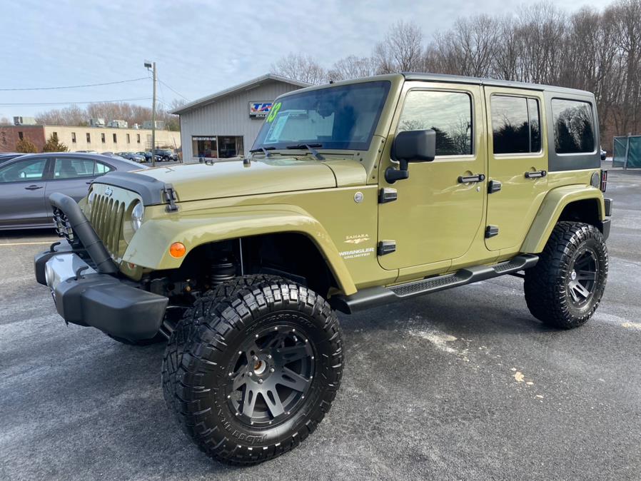 2013 Jeep Wrangler Unlimited 4WD 4dr Sahara, available for sale in Berlin, Connecticut | Tru Auto Mall. Berlin, Connecticut
