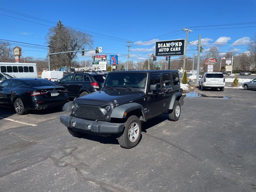 2014 Jeep Wrangler Unlimited 4WD 4dr Sport, available for sale in Vernon, Connecticut | TD Automotive Enterprises LLC DBA Diamond Auto Cars. Vernon, Connecticut