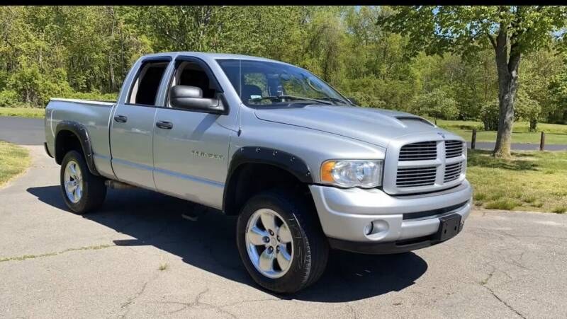 2004 Dodge Ram 1500 4dr Quad Cab 140.5" WB 4WD SLT, available for sale in Plainville, Connecticut | Choice Group LLC Choice Motor Car. Plainville, Connecticut