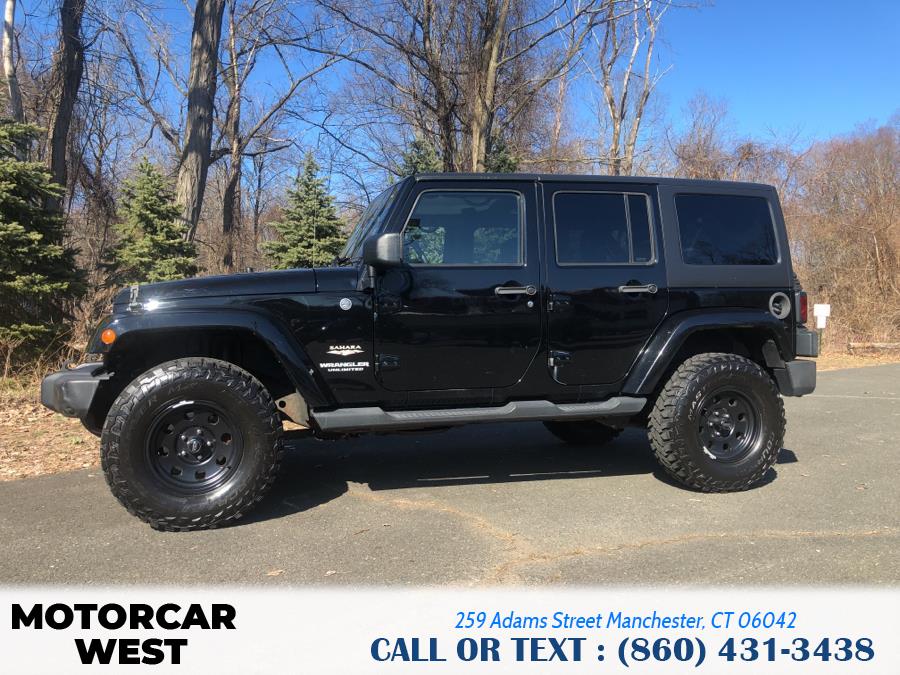 2011 Jeep Wrangler Unlimited 4WD 4dr Sahara, available for sale in Manchester, Connecticut | Motorcar West. Manchester, Connecticut