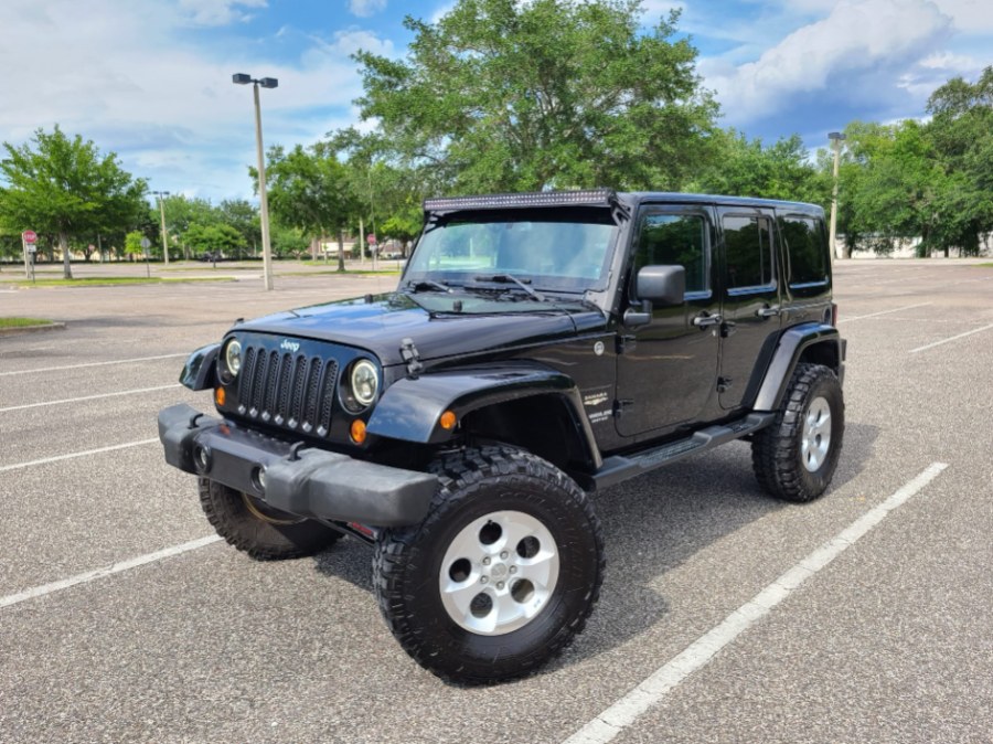 2013 Jeep Wrangler Unlimited 4WD 4dr Sahara, available for sale in Longwood, Florida | Majestic Autos Inc.. Longwood, Florida