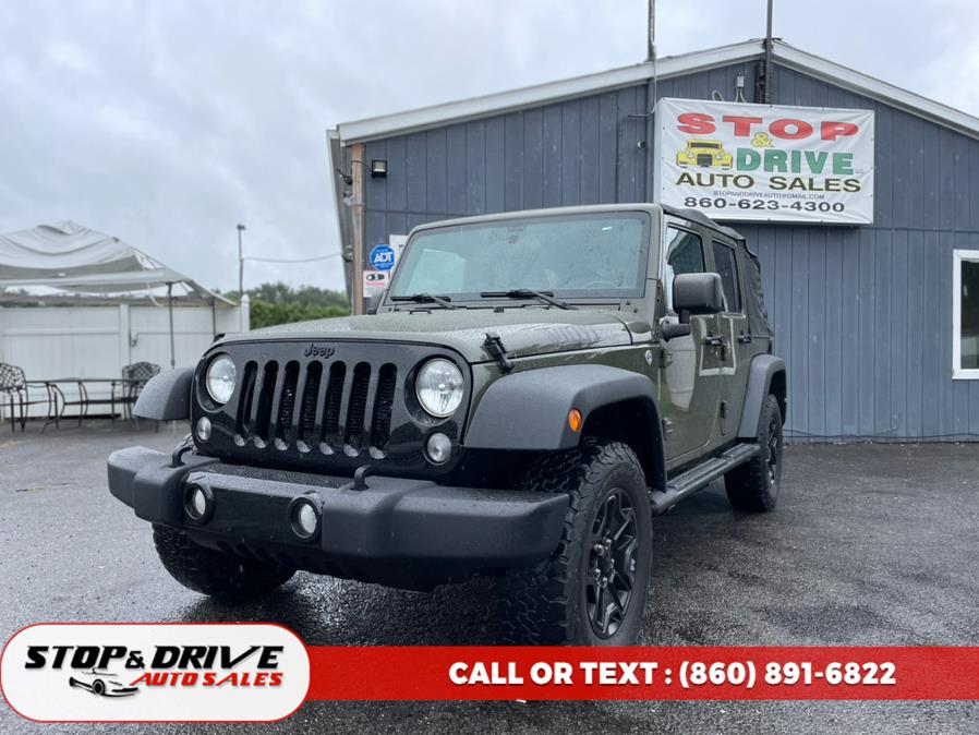 2015 Jeep Wrangler Unlimited 4WD 4dr Sport, available for sale in East Windsor, Connecticut | Stop & Drive Auto Sales. East Windsor, Connecticut