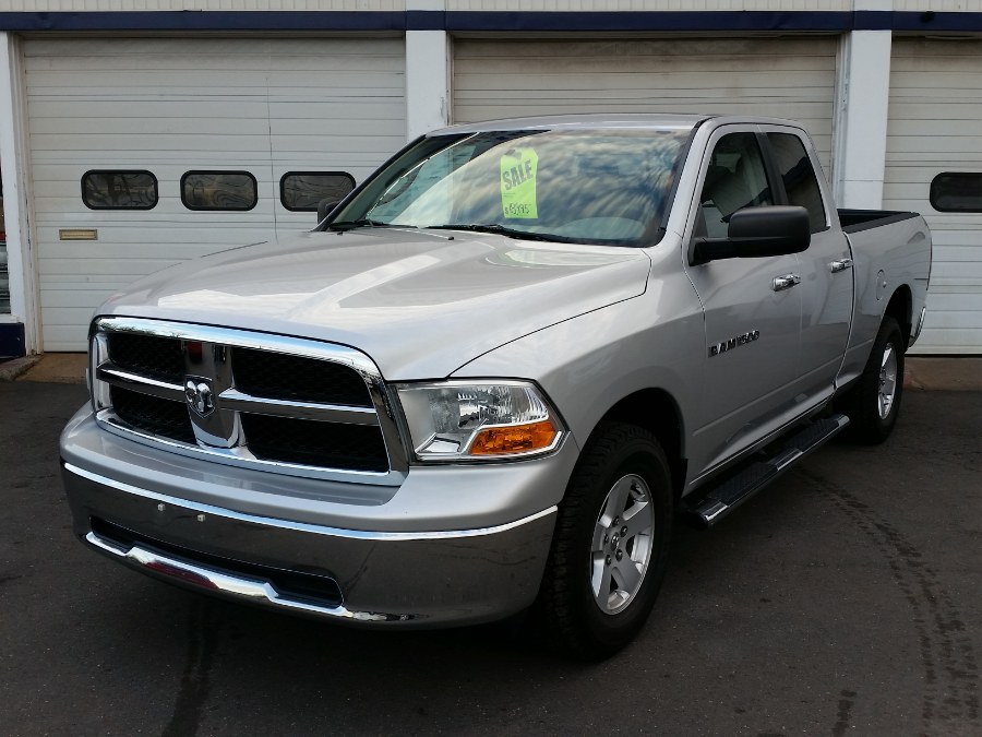 2012 Ram 1500 4WD Quad Cab 140.5" SLT, available for sale in Berlin, Connecticut | Action Automotive. Berlin, Connecticut