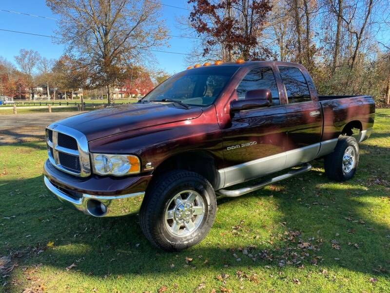 2005 Dodge Ram 2500 4dr Quad Cab 140.5" WB 4WD SLT, available for sale in Plainville, Connecticut | Choice Group LLC Choice Motor Car. Plainville, Connecticut