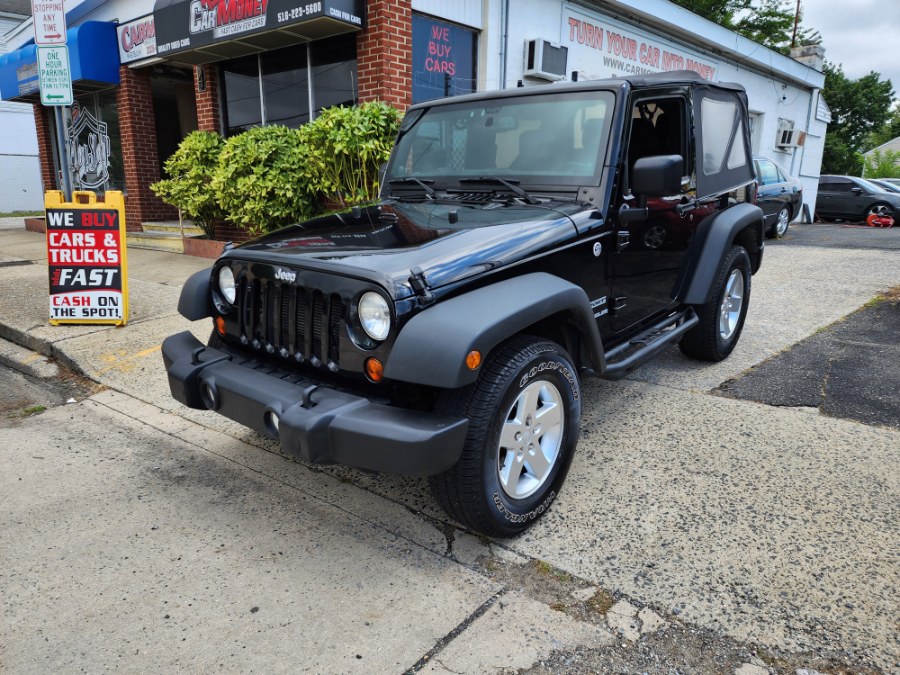 2013 Jeep Wrangler 4WD 2dr Sport, available for sale in Baldwin, New York | Carmoney Auto Sales. Baldwin, New York