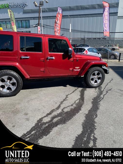 2011 Jeep Wrangler Unlimited Sahara - Photo 9