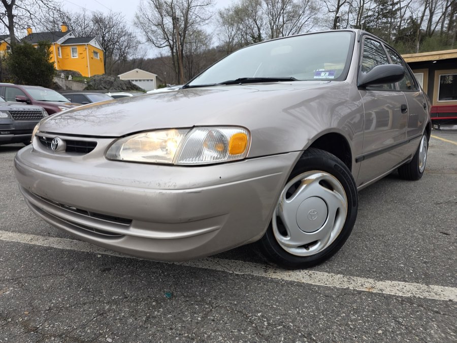 Brown (Beige) 2000 Toyota Corolla VE Sedan Front-Wheel Drive Automatic