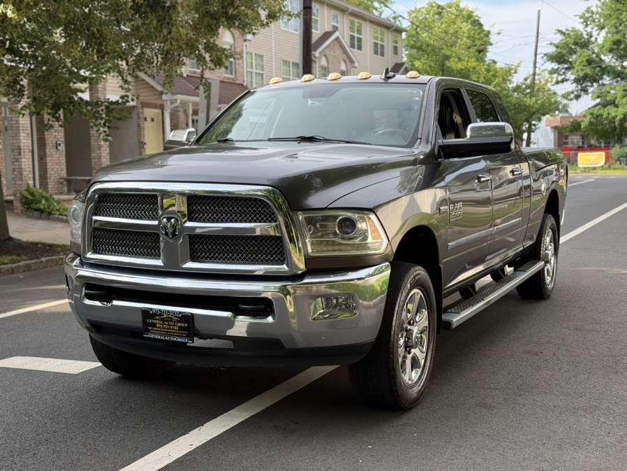 Gray (Granite Crystal Metallic Clearcoat) 2015 RAM 2500 Laramie Longhorn Mega Cab 4WD Pickup Truck Four-Wheel Drive Automatic