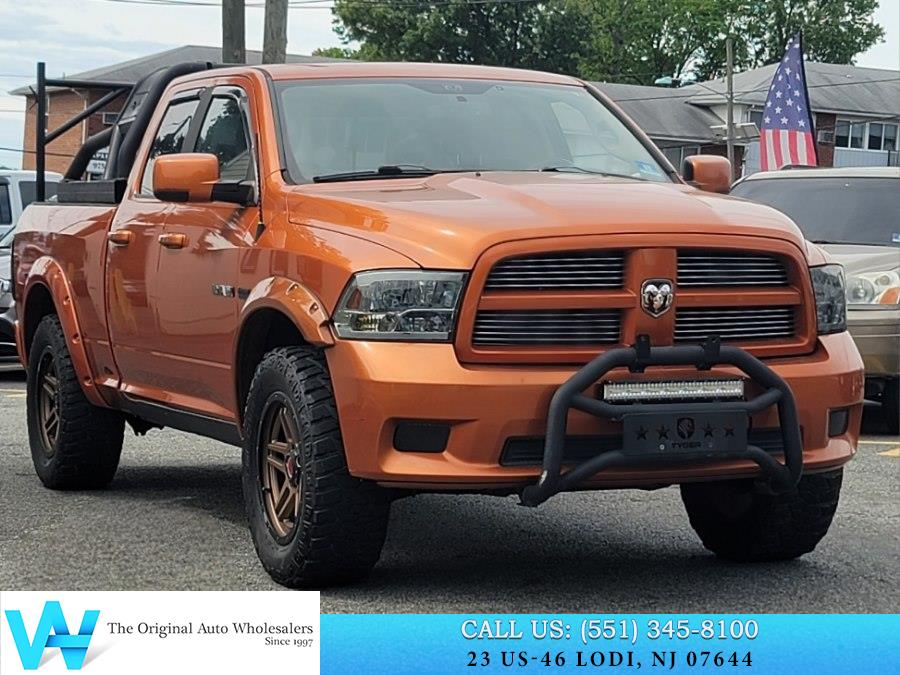 Orange (Mango Tango Pearl) 2010 Dodge RAM 1500 Pickup Truck Automatic