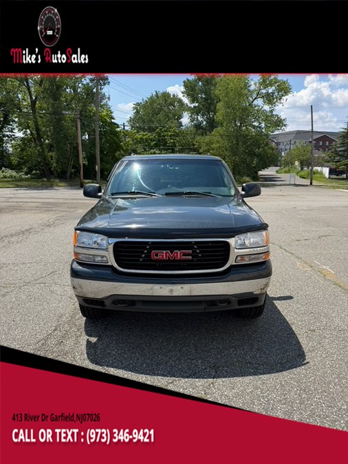 2003 GMC Yukon 4WD 1/2 Ton SLE's photo