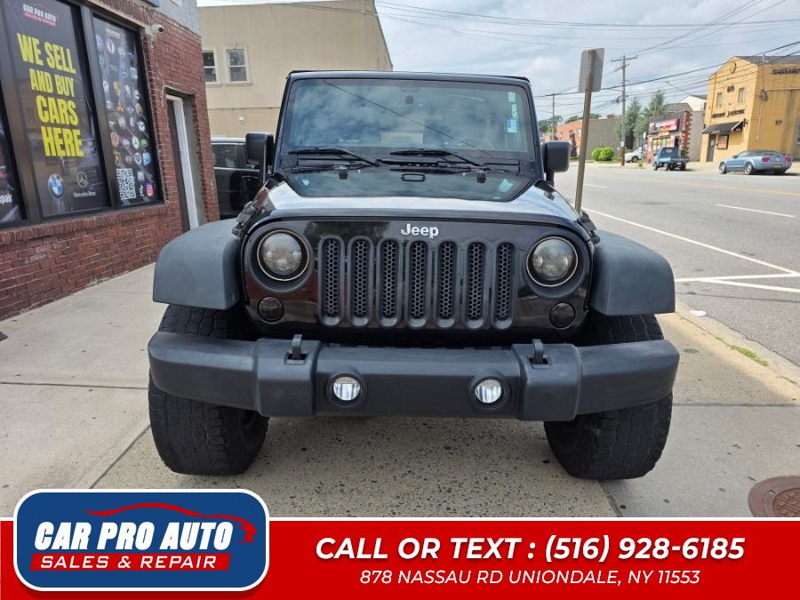 Used 2013 Jeep Wrangler in Uniondale, New York | Car Pro Auto. Uniondale, New York