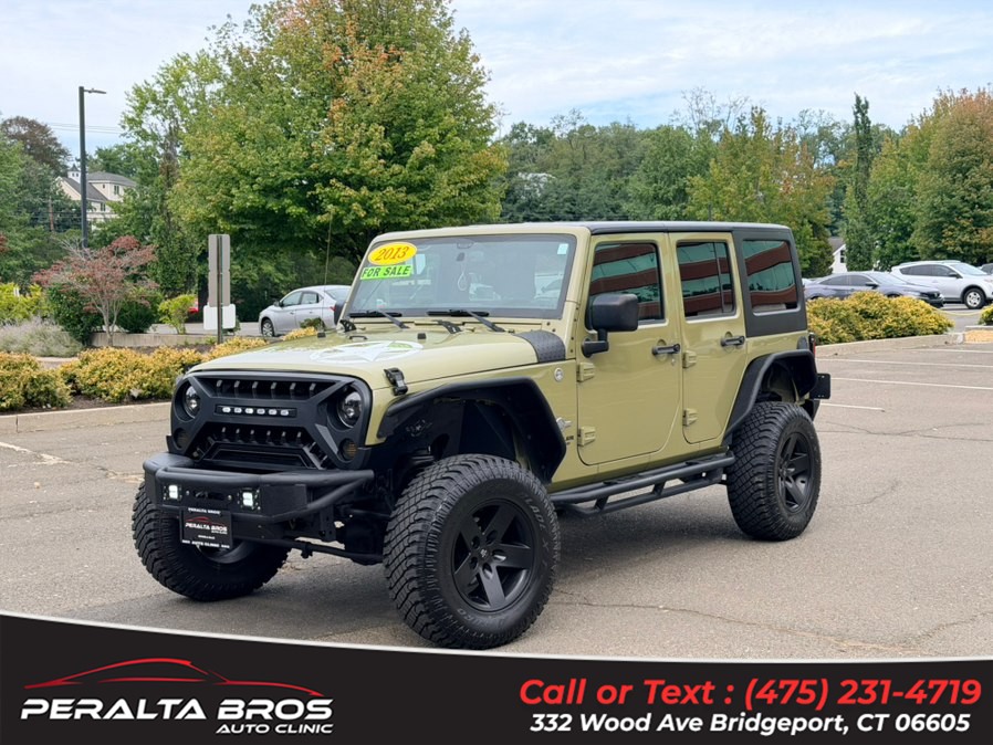 2013 Jeep Wrangler Unlimited 4WD 4dr Freedom Edition *Ltd Avail*, available for sale in Bridgeport, Connecticut | Peralta Bros Auto Clinic. Bridgeport, Connecticut