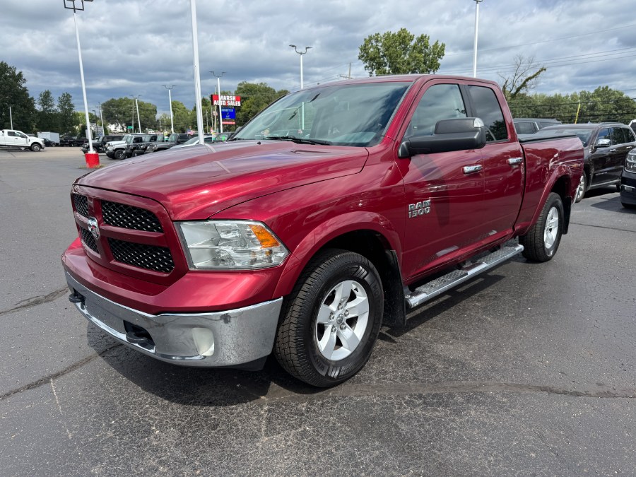 2014 Ram 1500 4WD Quad Cab 140.5" Outdoorsman, available for sale in Ortonville, Michigan | Marsh Auto Sales LLC. Ortonville, Michigan