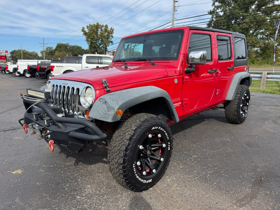 2011 Jeep Wrangler Unlimited 4WD 4dr Sport, available for sale in Ortonville, Michigan | Marsh Auto Sales LLC. Ortonville, Michigan