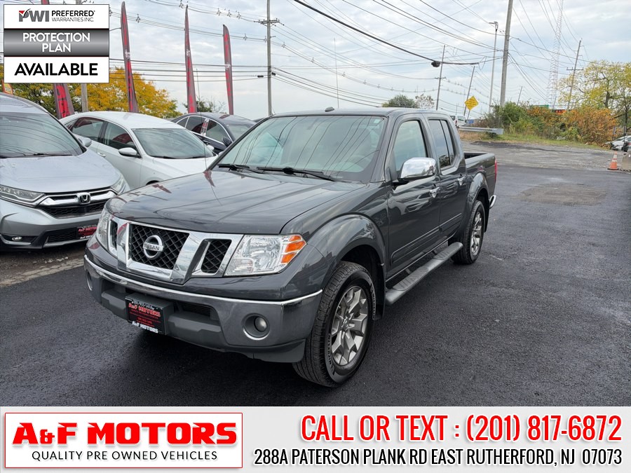 2014 Nissan Frontier 4WD Crew Cab SWB Auto SL, available for sale in East Rutherford, New Jersey | A&F Motors LLC. East Rutherford, New Jersey